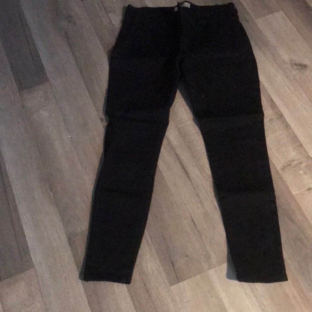 Black straight leg jeans. Never worn. Size 4